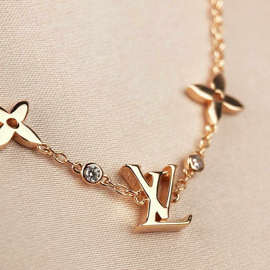 [GALE]STAR AND SUN 7 MOTIFS GOLD BRACELET